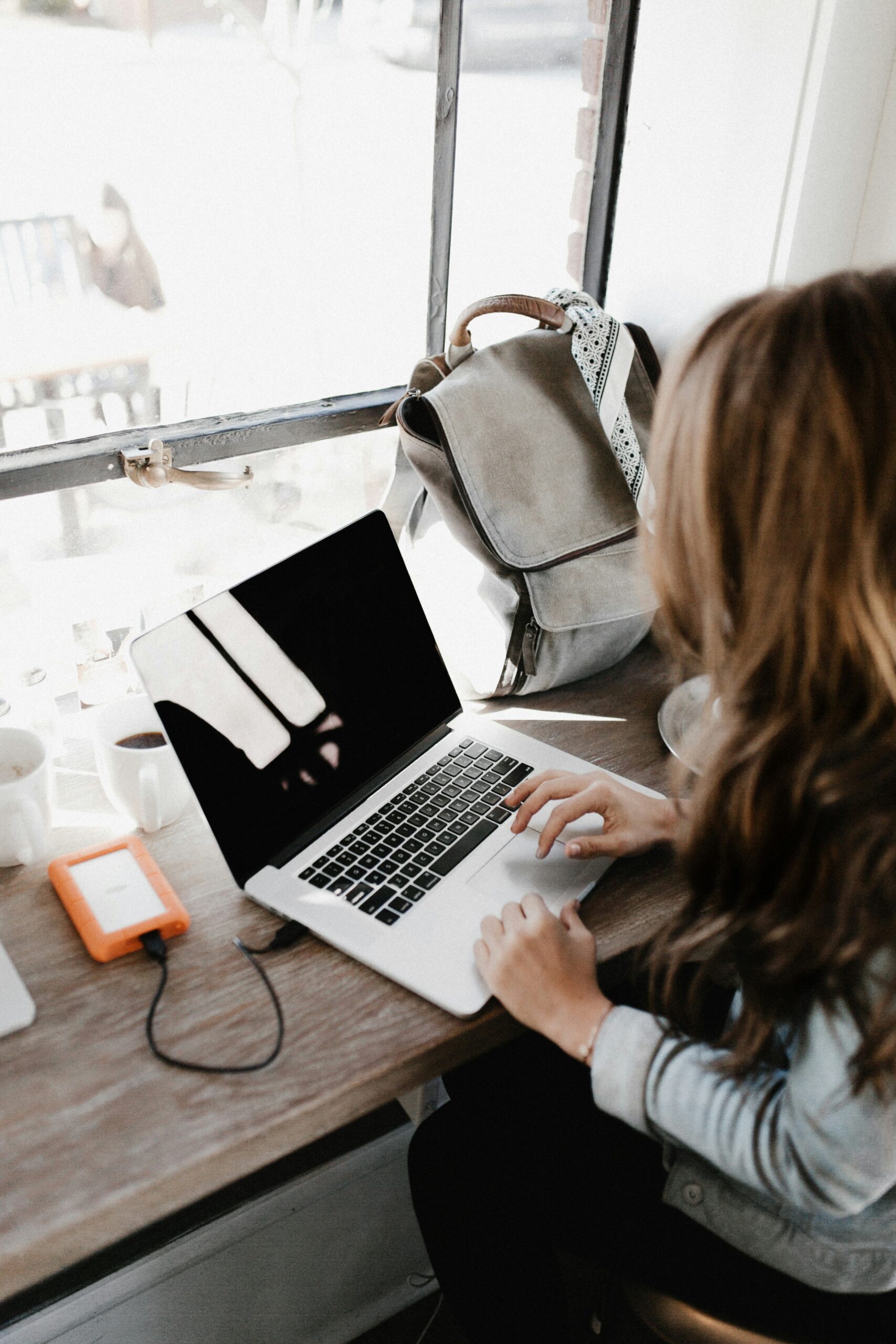 a marketer using a laptop