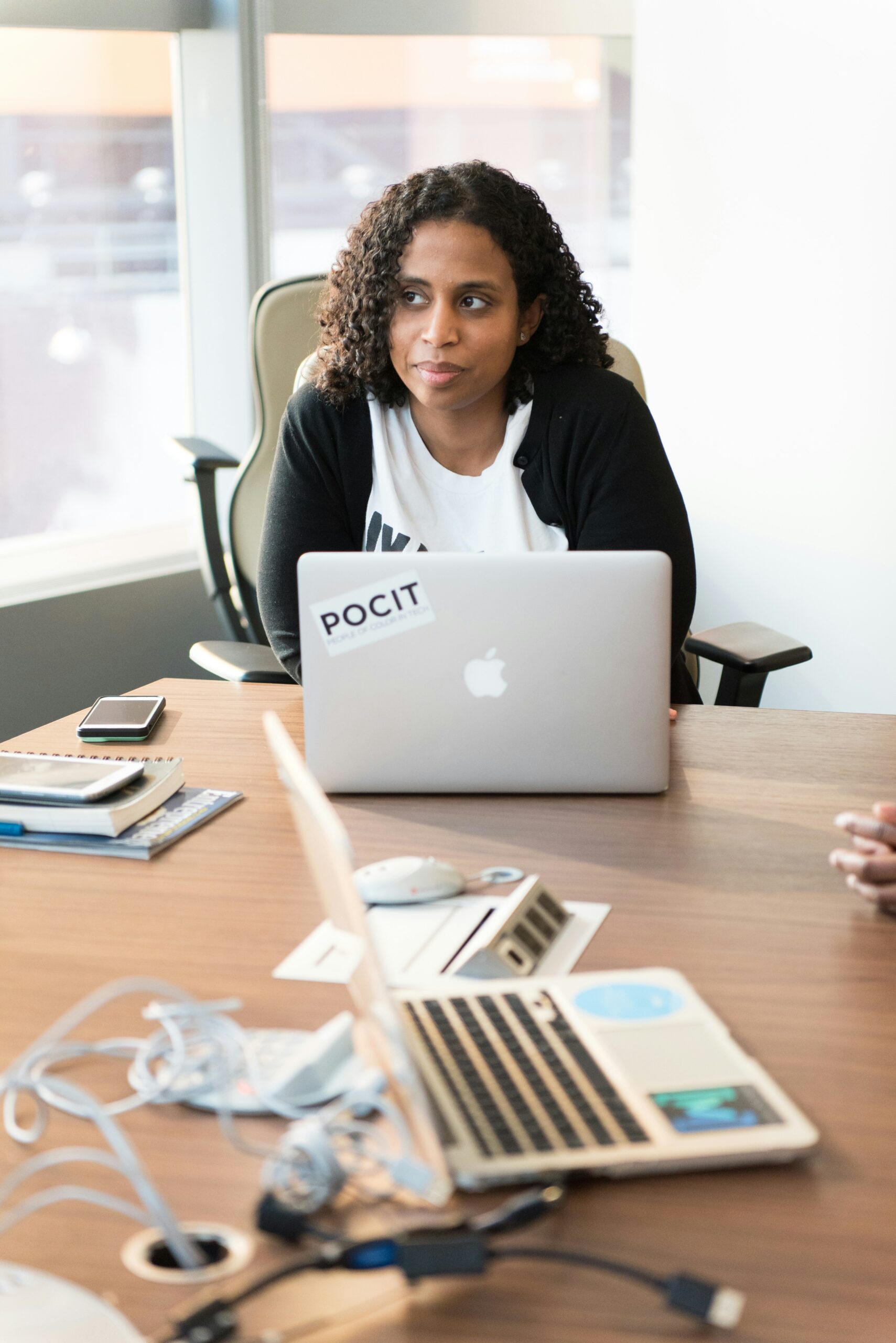 a woman working on a laptop - Nurture Machines a woman working on a laptop