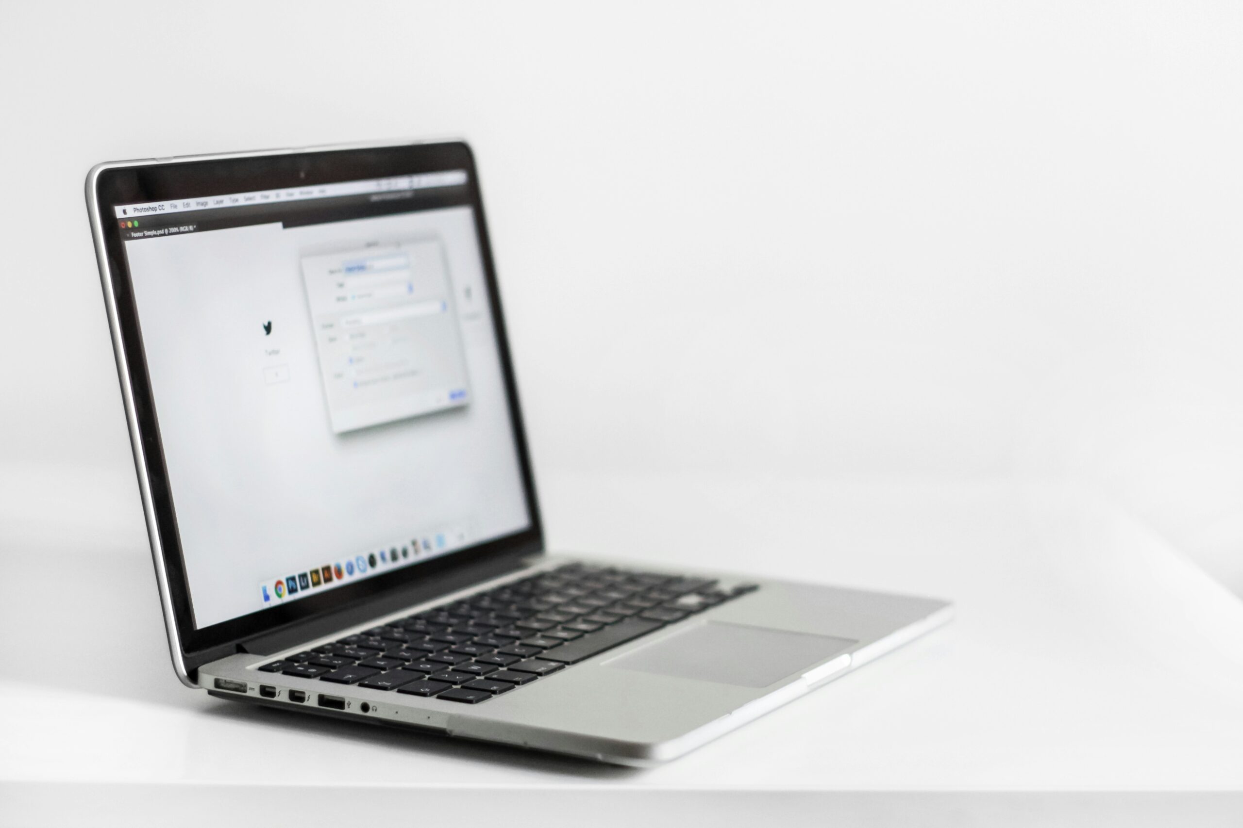 a laptop on a desk - Nurture Machines a laptop on a desk