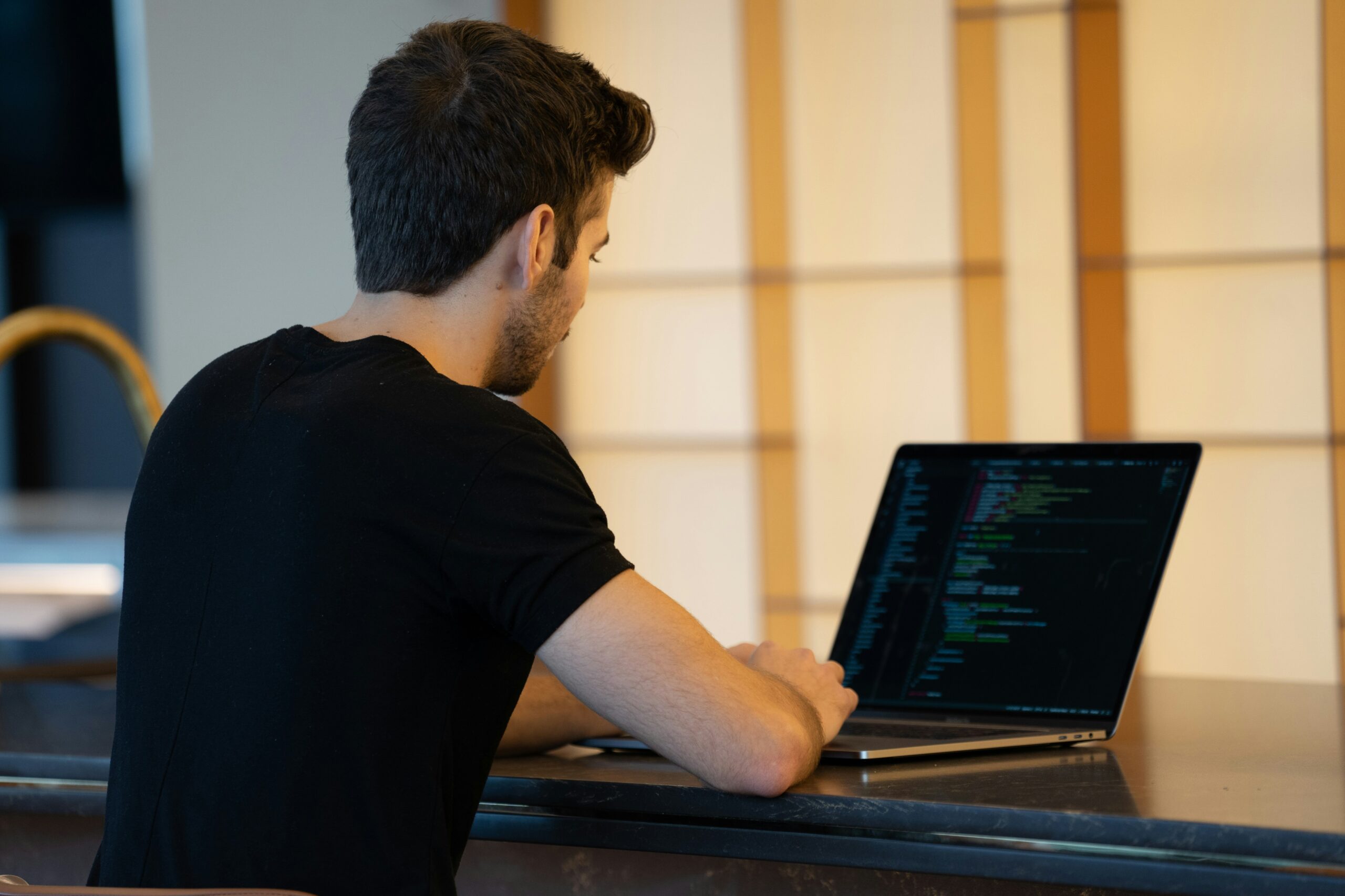 a person using a laptop - Nurture Machines a person using a laptop