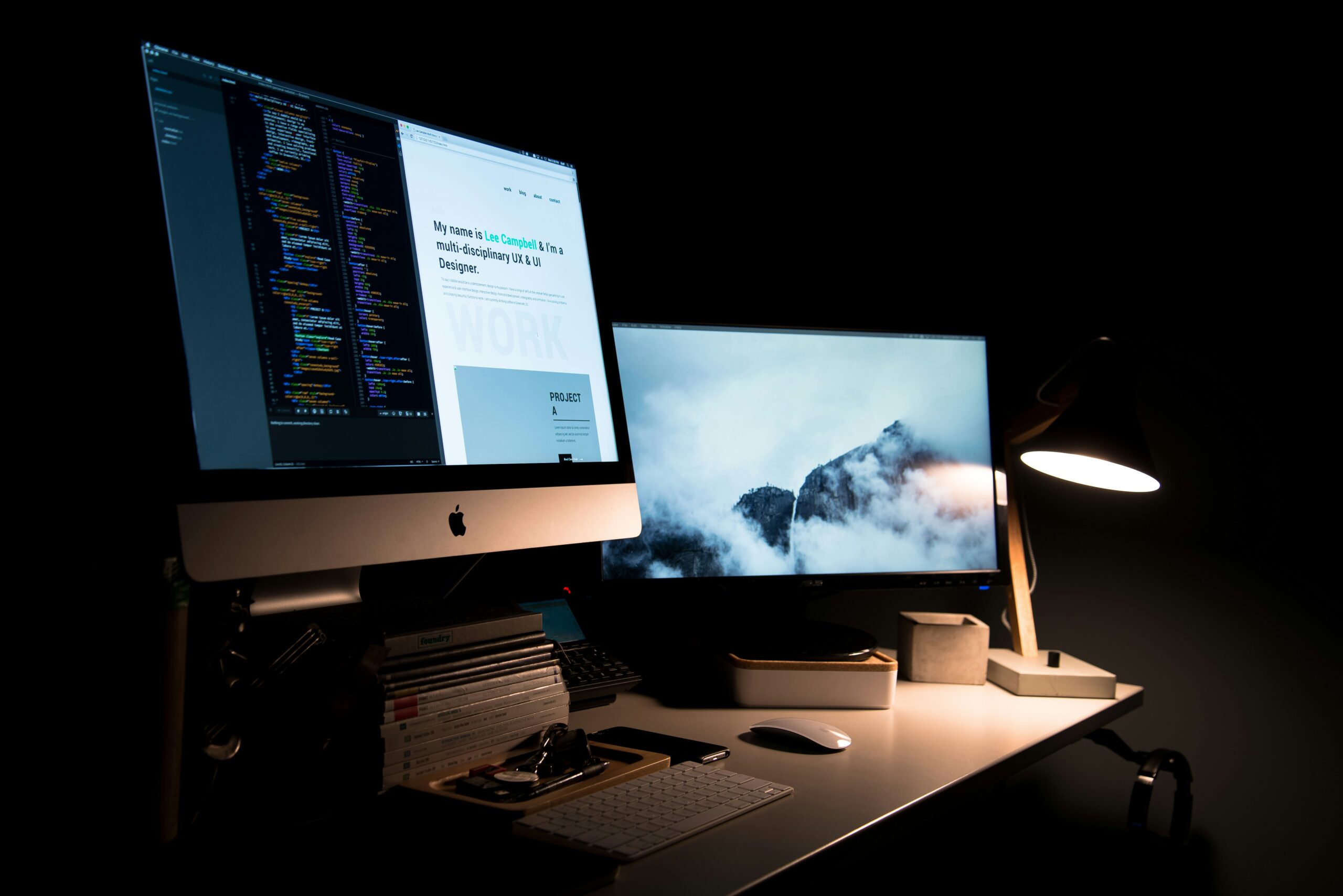 A dual-monitor setup displaying code and a web design layout, highlighting efforts to refine content and design for improved user experience and higher conversion rates.