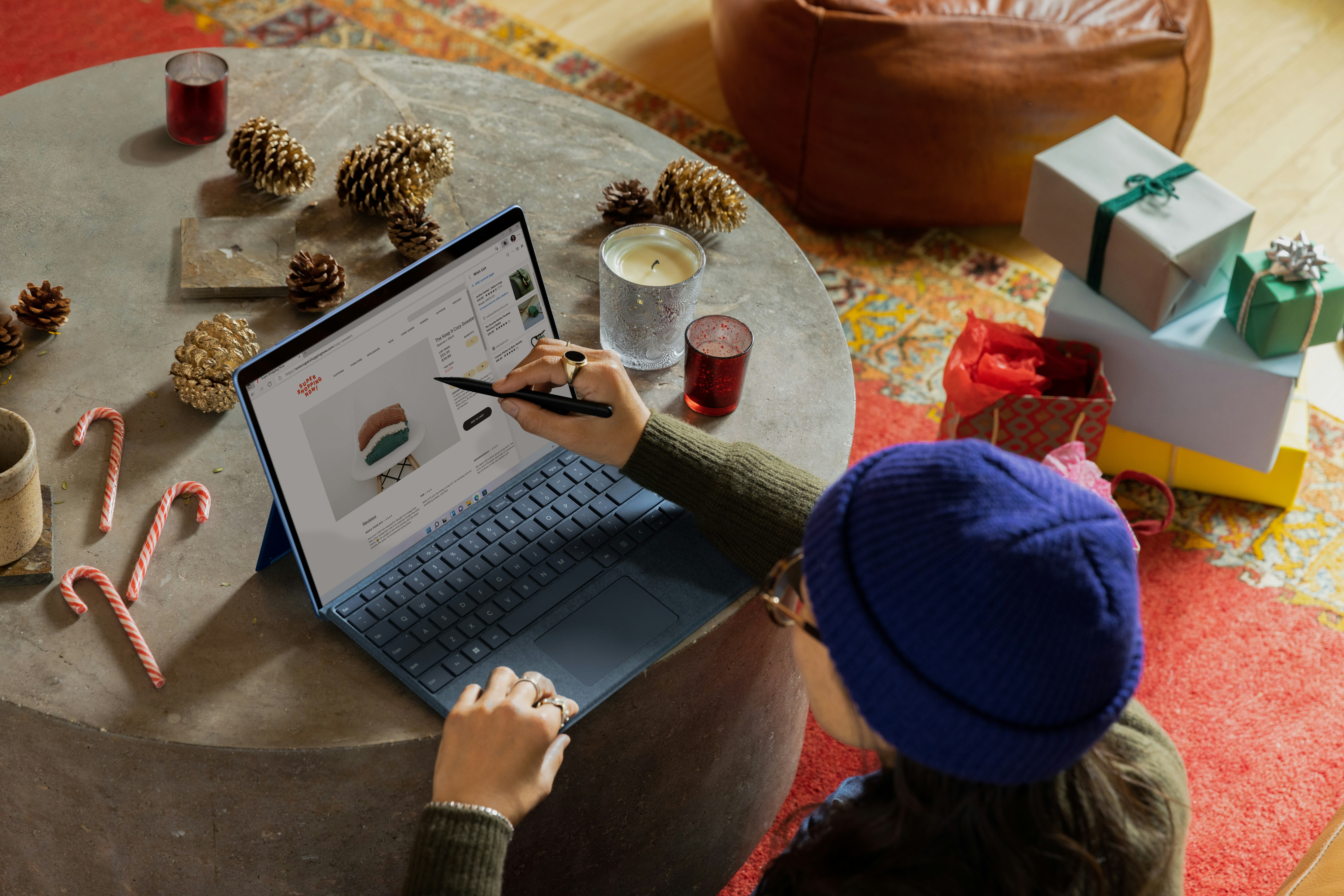 Person browsing a product landing page on a tablet during holiday shopping, highlighting the impact of conversion-focused design.